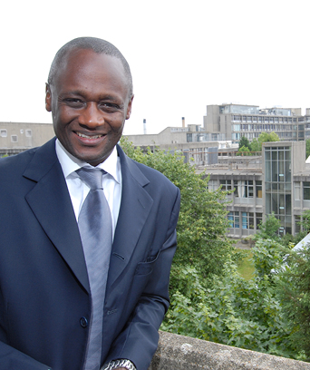 Male in suit smiling at camera