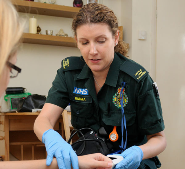 Female taking patient's reading