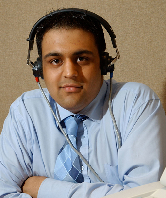 Male audiologist wearing headphones