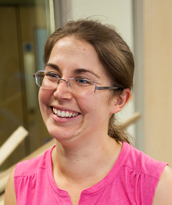 Female smiling off camera