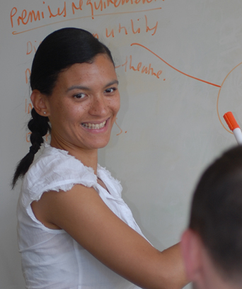 Female writing on whiteboard